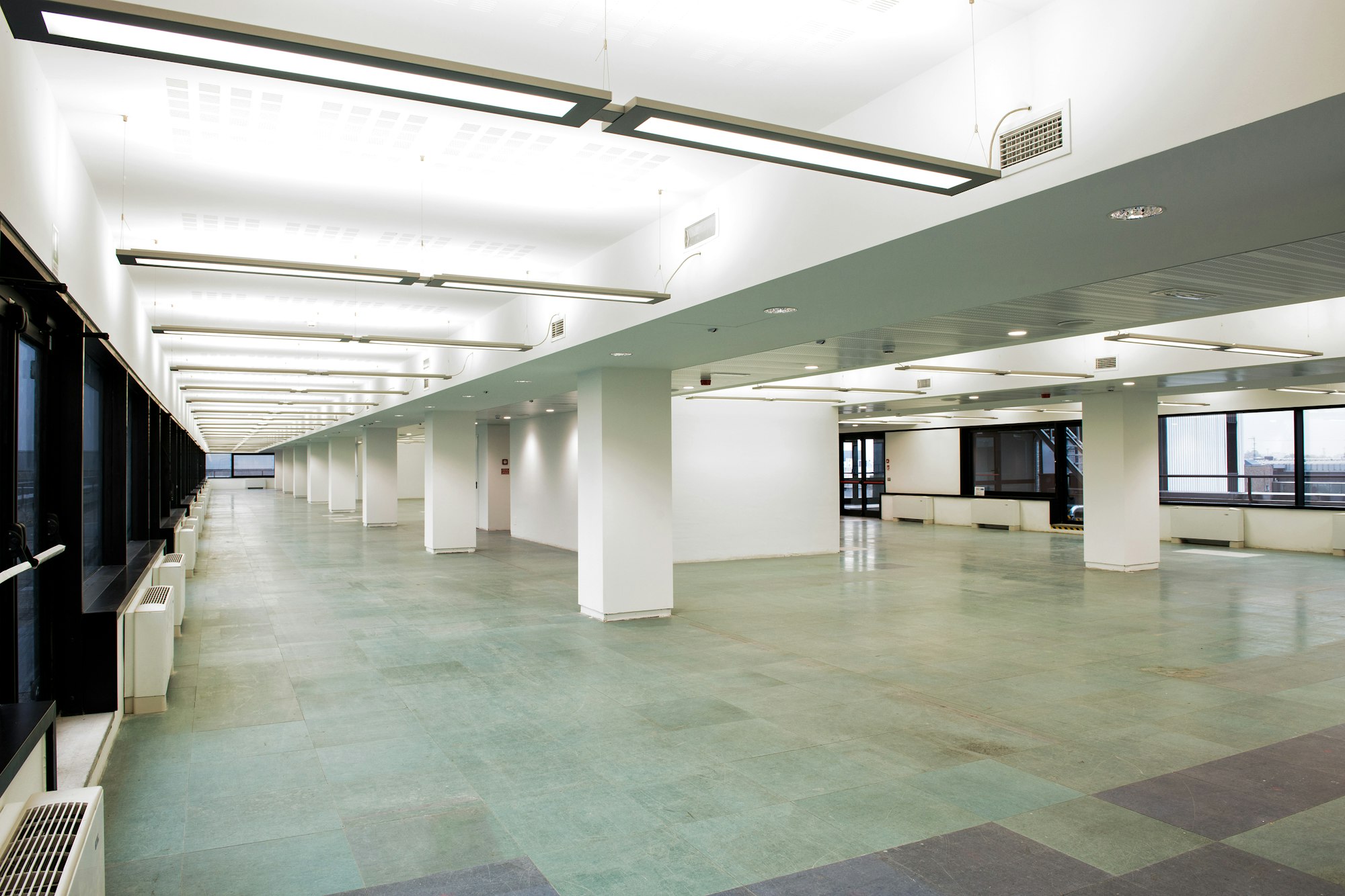 Bright and empty business offices with long hall